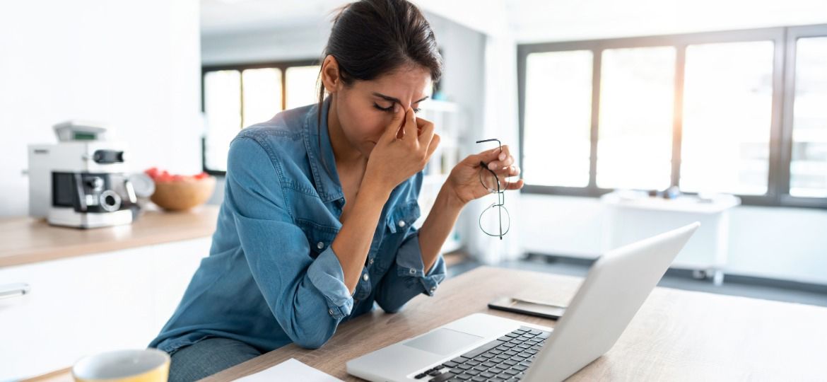 stressed woman foreclosure scam
