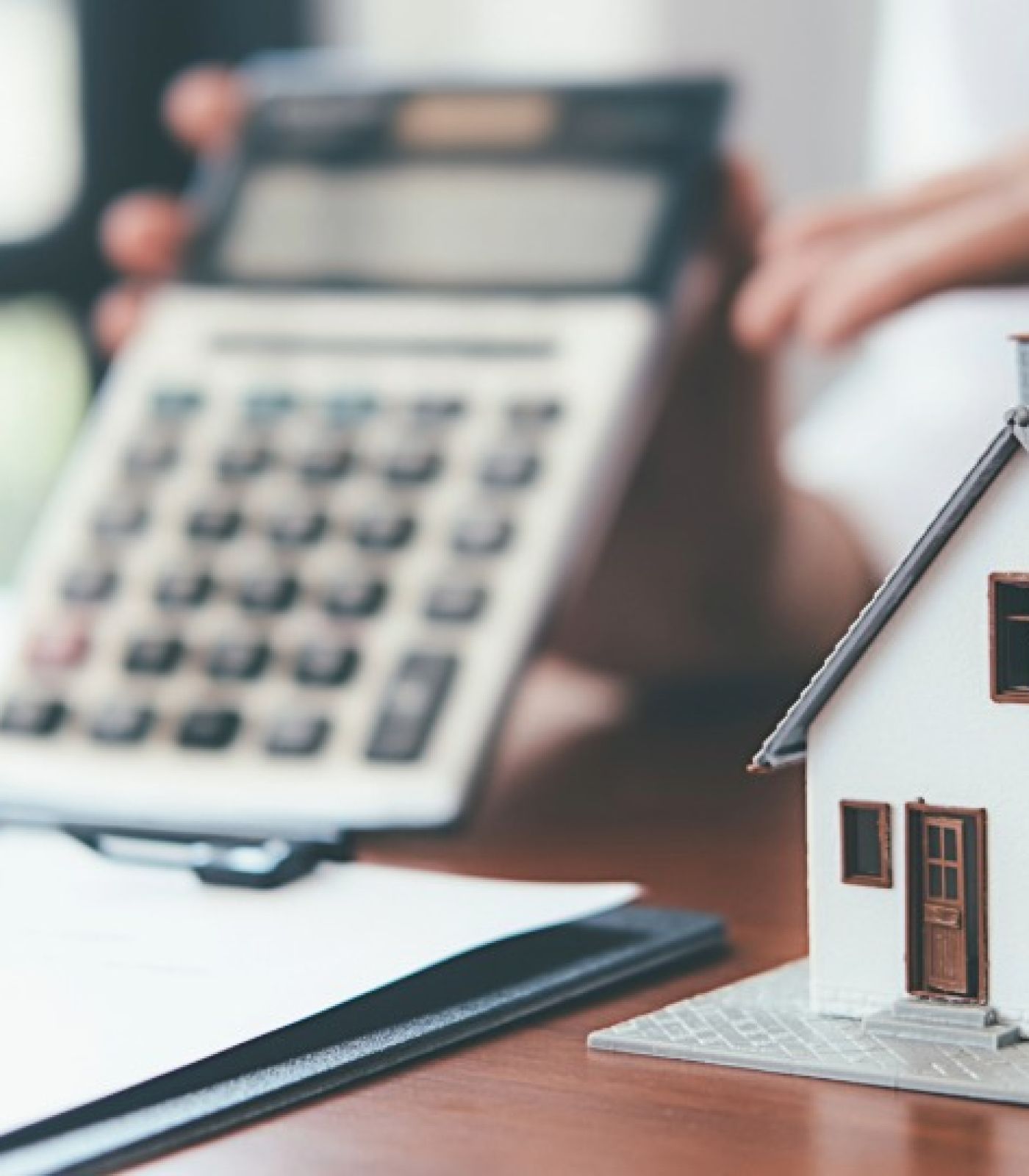 A New England homeowner compares bank statements against a mortgage statement that wrongly says the payments are behind.