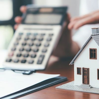 A New England homeowner compares bank statements against a mortgage statement that wrongly says the payments are behind.